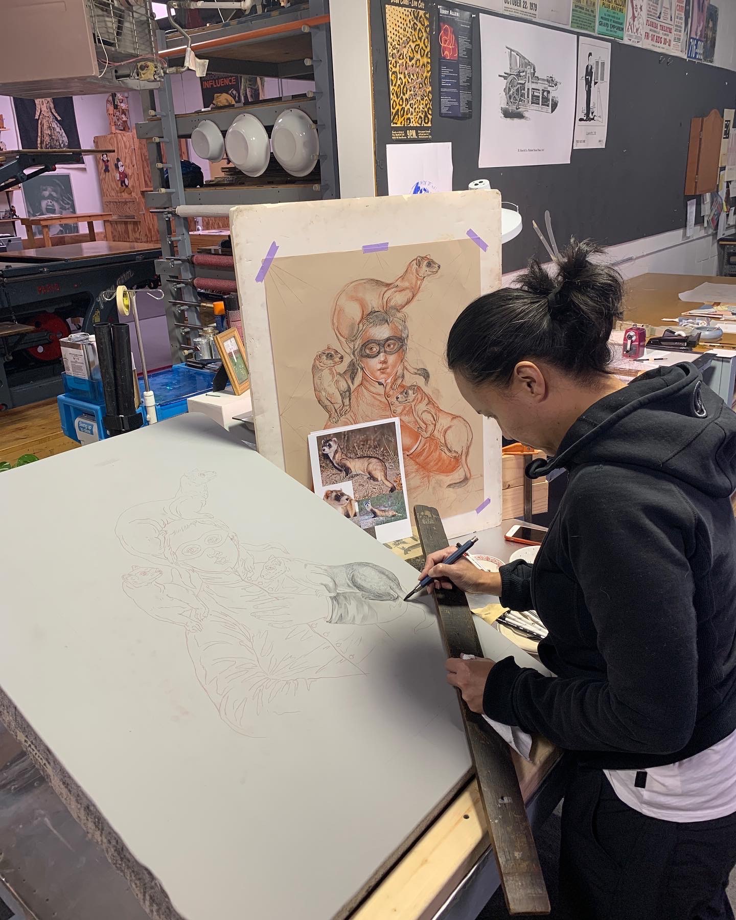 Artist Fatima Ronquillo printmaking at Black Rock Editions print shop 